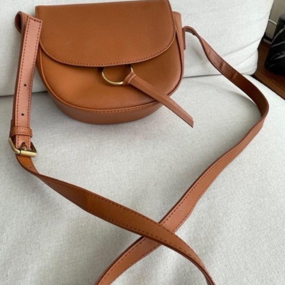 Small tan cross body purse